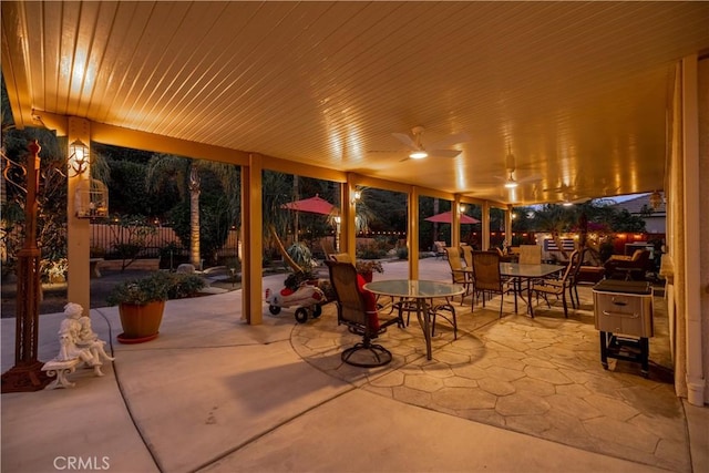 view of patio featuring ceiling fan