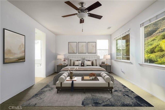 bedroom featuring visible vents, baseboards, and ceiling fan