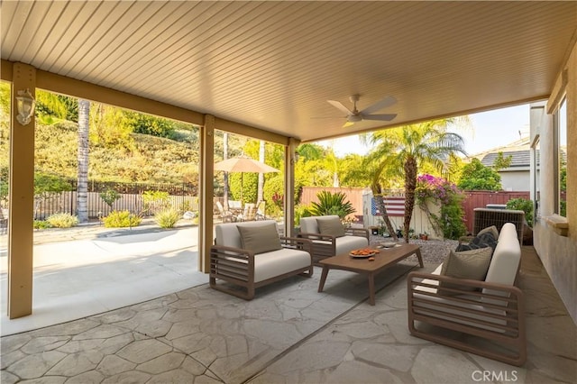 view of patio / terrace featuring central AC unit, an outdoor living space, a fenced backyard, and ceiling fan