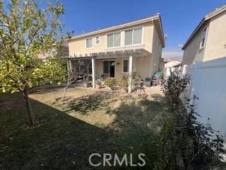 back of property featuring a patio