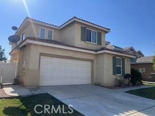 front of property featuring a garage