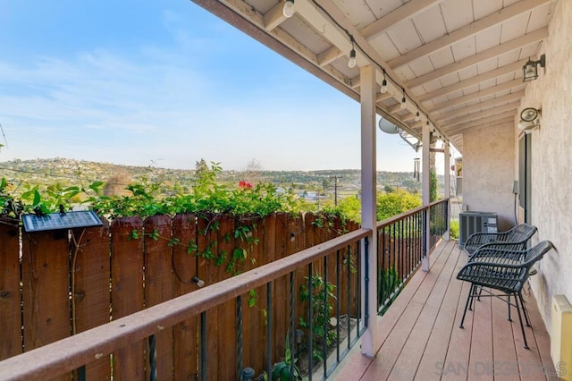 wooden terrace with central air condition unit