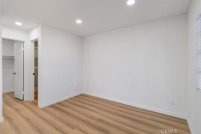 empty room featuring light hardwood / wood-style floors