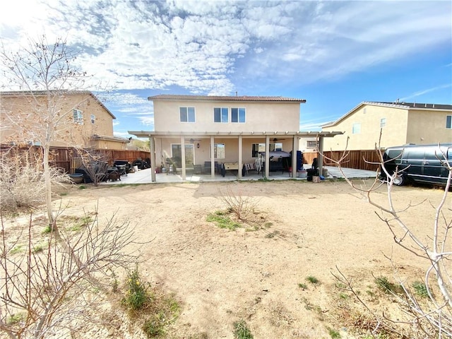 rear view of property with a patio