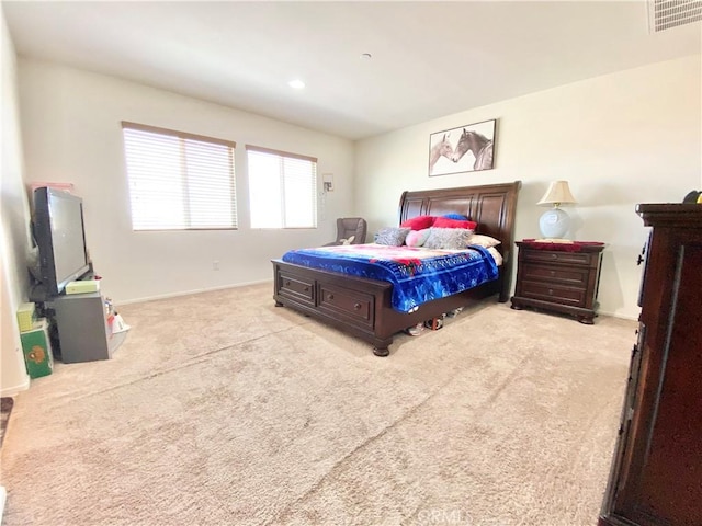 bedroom with light carpet