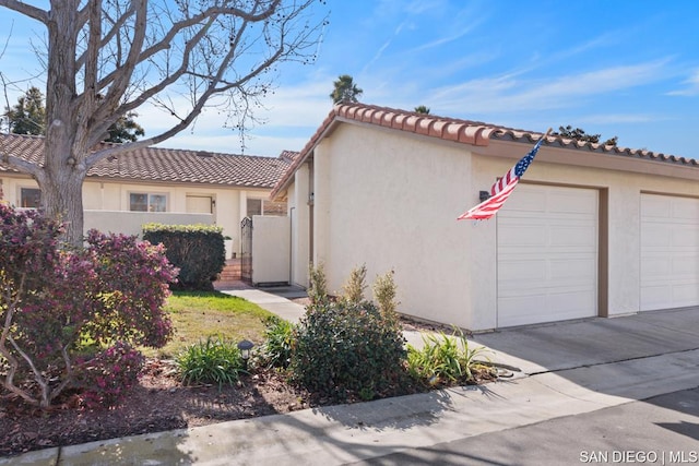 view of home's exterior with a garage