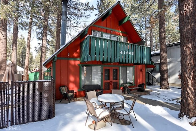 view of snow covered house