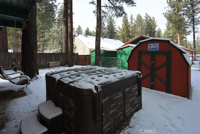 exterior space featuring a shed and a hot tub