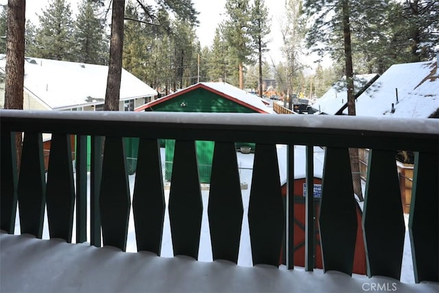 view of snow covered deck