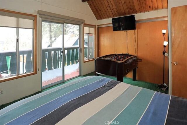 bedroom featuring wood ceiling, access to exterior, and vaulted ceiling with beams