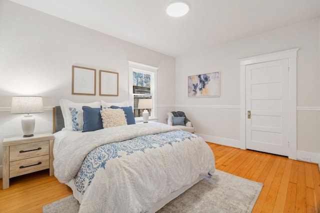 bedroom featuring wood-type flooring