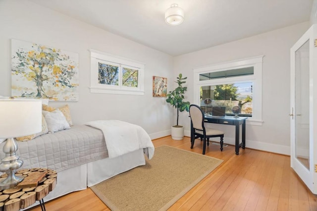 bedroom featuring wood-type flooring