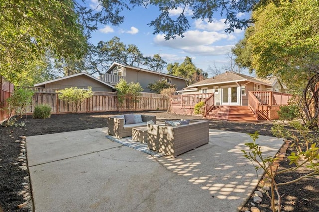 view of patio / terrace with an outdoor living space and a deck