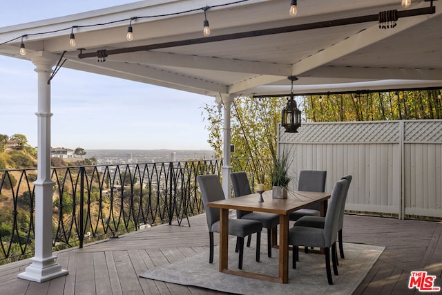 wooden deck featuring a gazebo