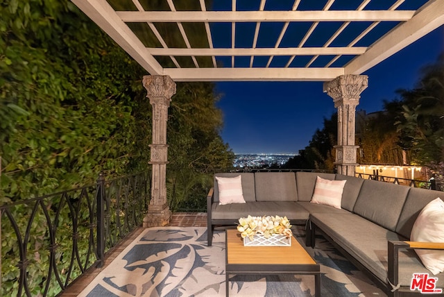 patio at night with an outdoor hangout area