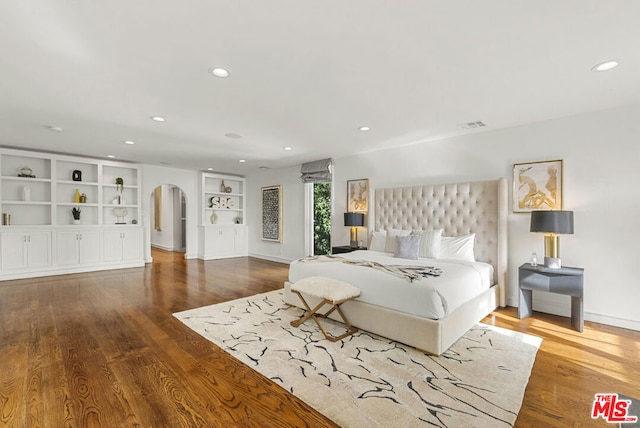 unfurnished bedroom with wood-type flooring