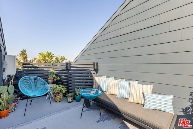 view of patio with a balcony