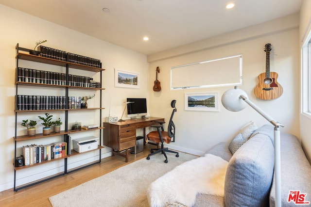 office area with light wood-type flooring