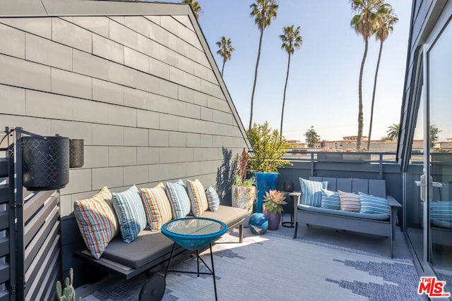 view of patio / terrace featuring outdoor lounge area and a balcony