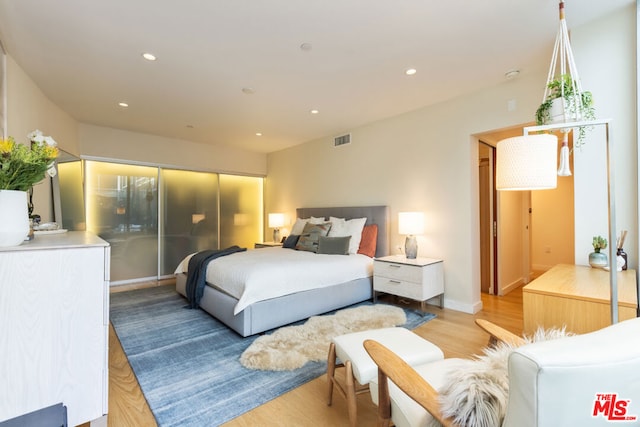 bedroom featuring light hardwood / wood-style flooring