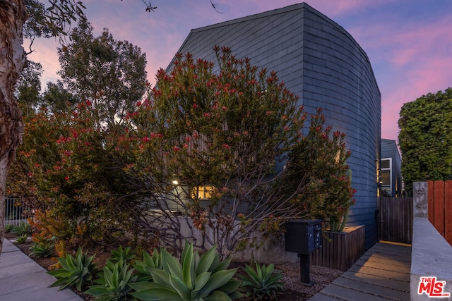 view of property exterior at dusk