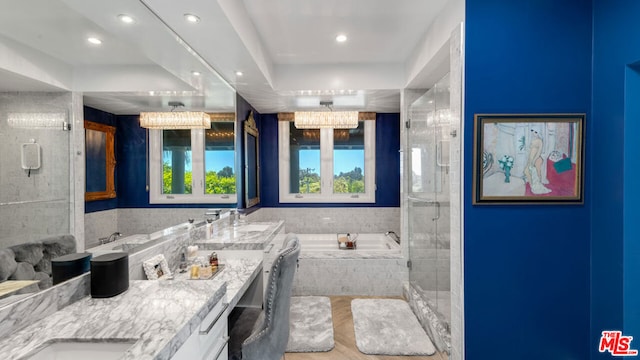 bathroom featuring vanity, hardwood / wood-style flooring, and independent shower and bath