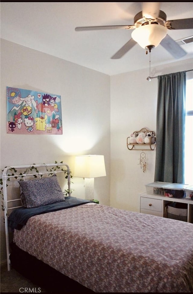 bedroom featuring visible vents and a ceiling fan