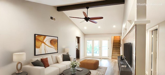 living room featuring a ceiling fan, visible vents, high vaulted ceiling, beam ceiling, and light wood-type flooring