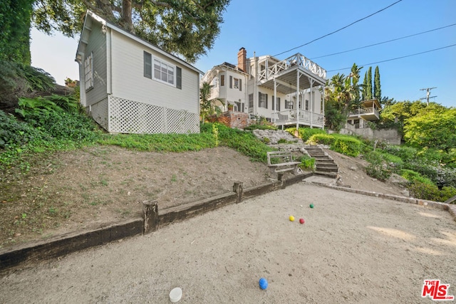 view of front of property with a balcony