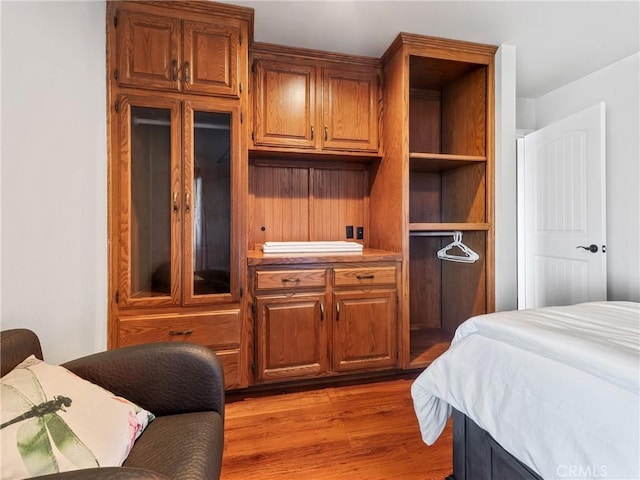 bedroom with hardwood / wood-style floors