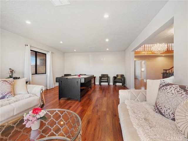 living room with dark hardwood / wood-style floors