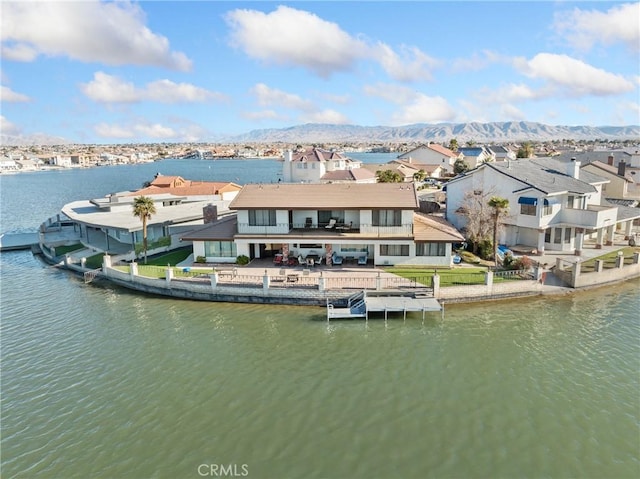 bird's eye view featuring a water and mountain view