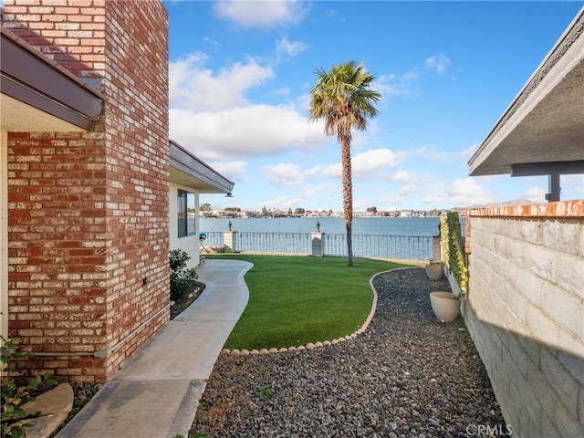 view of yard featuring a water view