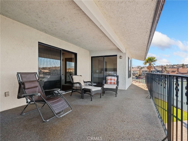 view of patio / terrace featuring a balcony