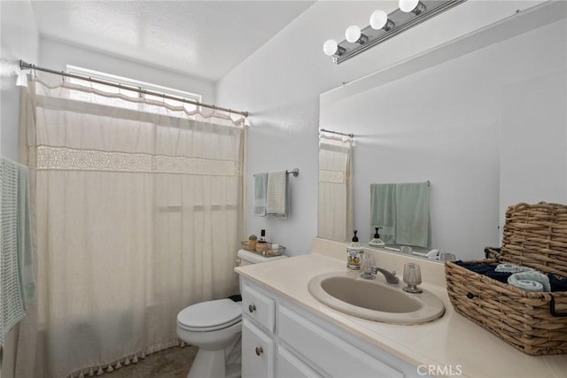 full bath with toilet and vanity