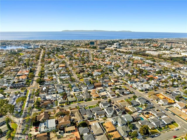 aerial view featuring a water view and a residential view