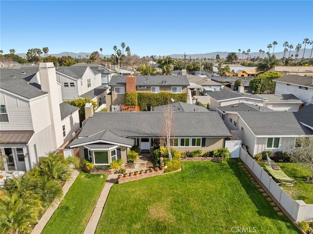 bird's eye view with a mountain view and a residential view