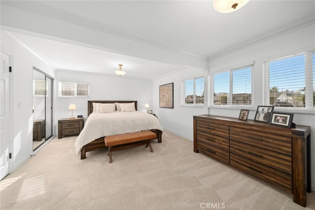 bedroom featuring crown molding, light colored carpet, and baseboards