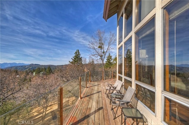 deck featuring a mountain view