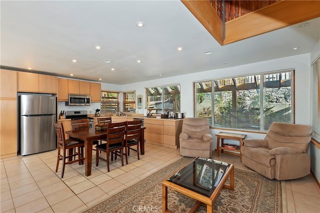 dining space with light tile patterned floors