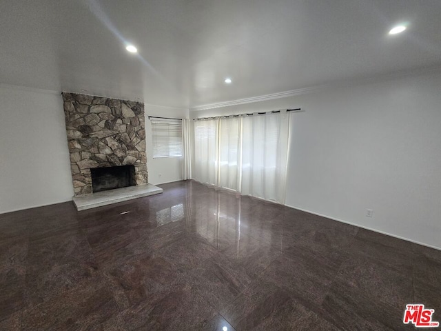 unfurnished living room with a fireplace