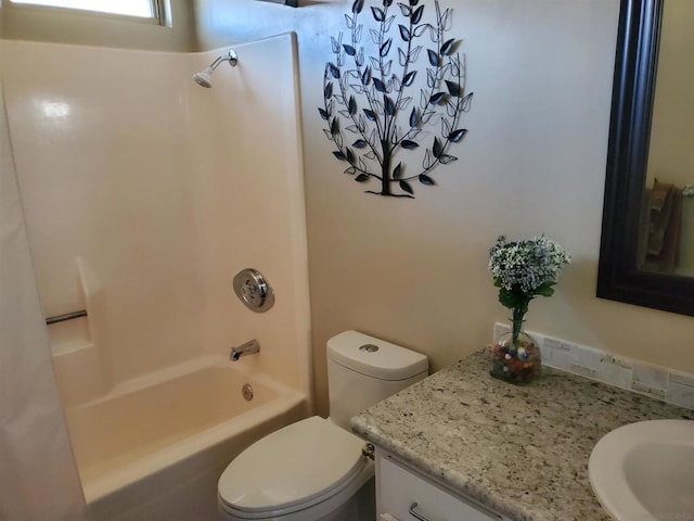 full bathroom featuring vanity, shower / bathtub combination, and toilet