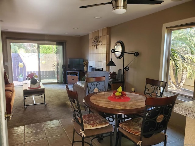 dining room featuring ceiling fan