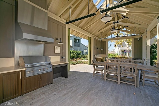 view of patio / terrace with a gazebo, an outdoor kitchen, a grill, and ceiling fan