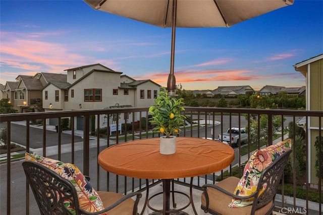 view of balcony at dusk