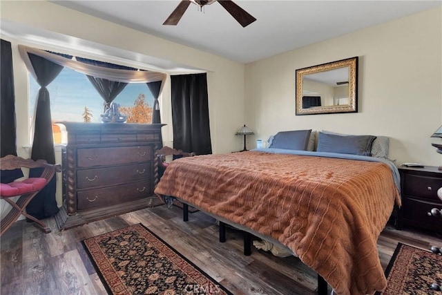 bedroom featuring ceiling fan and hardwood / wood-style floors