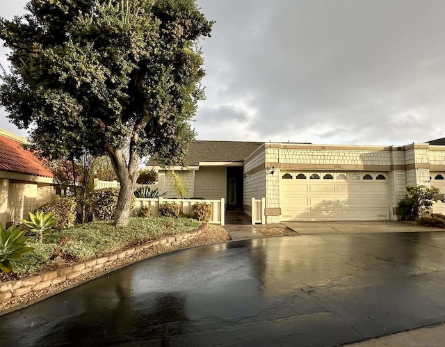 view of front of home with a garage