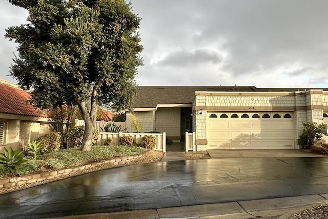 view of front of home with a garage