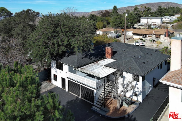 aerial view featuring a mountain view