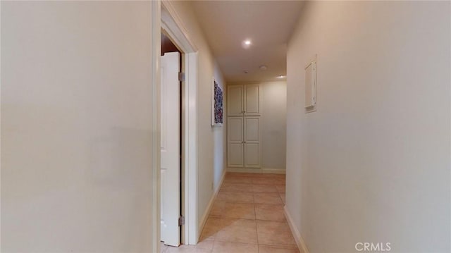 corridor with light tile patterned floors